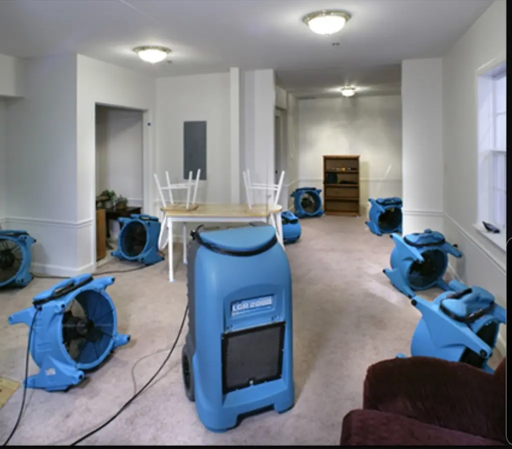 Air movers and dehumidifier setup for Water Damage Restoration in Barrington